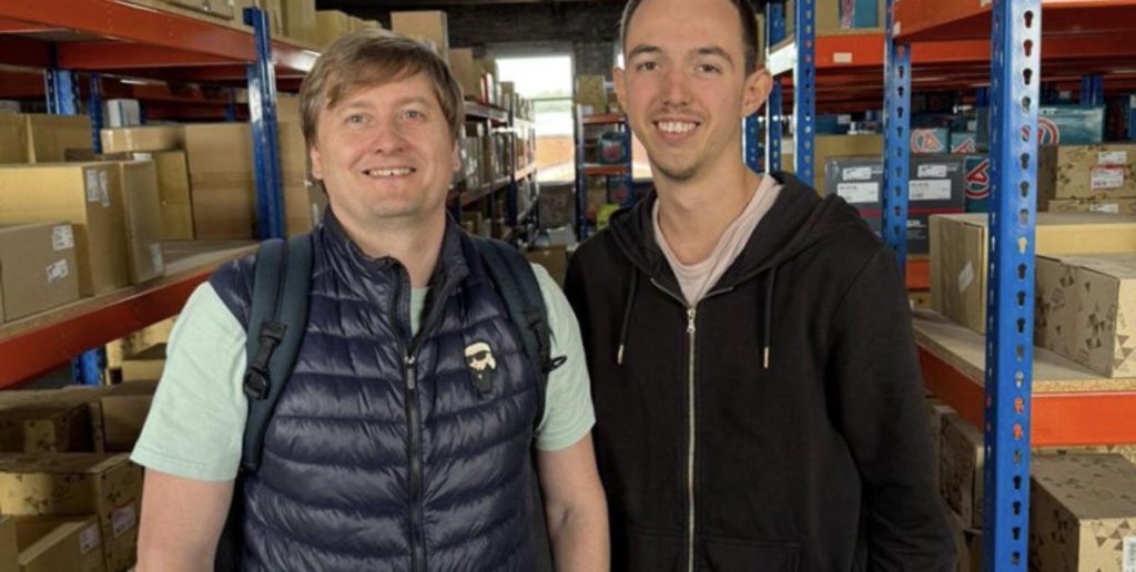 Paul Ryazanov visiting the Wing Mirror Man warehouse with his team