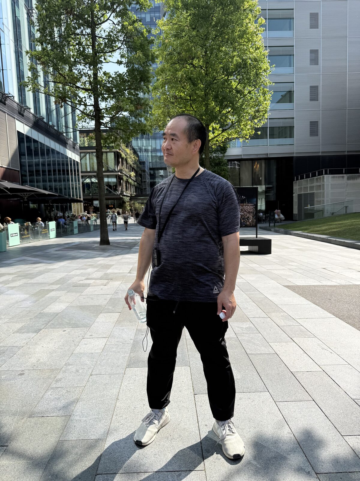 Dennis Yu in a Manchester courtyard, July 2026