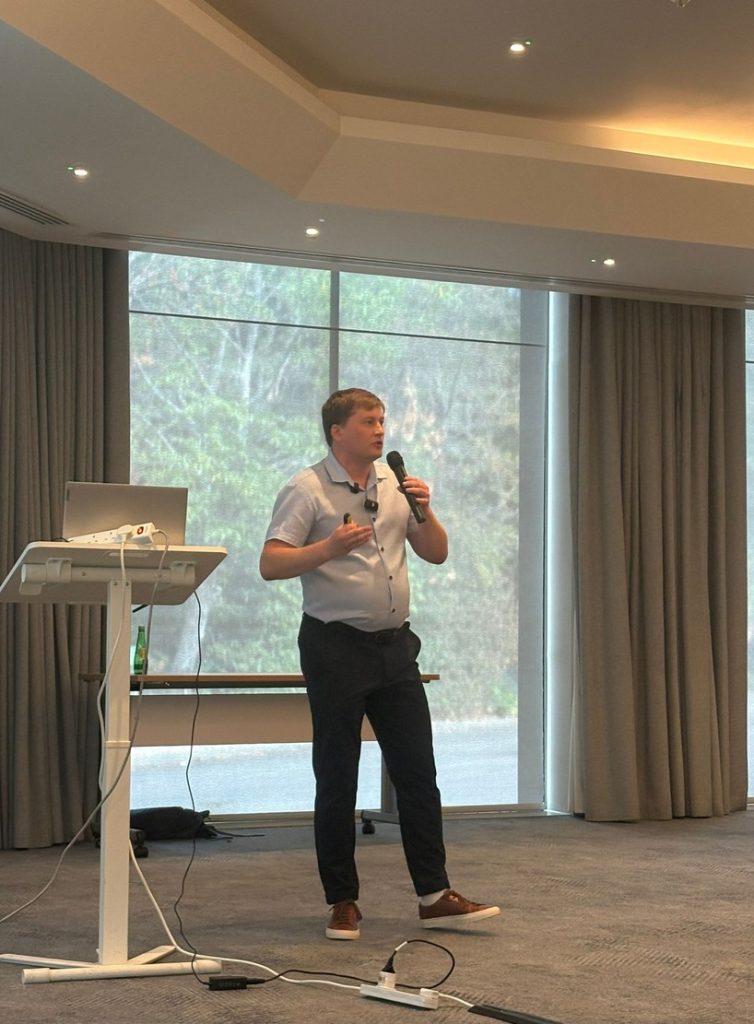 Paul Ryazanov speaking at the UK SEO Summit 2026