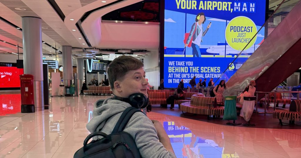 Paul Ryazanov at Manchester Airport departures, illustrating UK technical talent leaving the country
