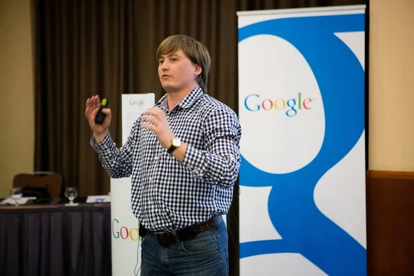 Paul Ryazanov speaking at a Google workshop