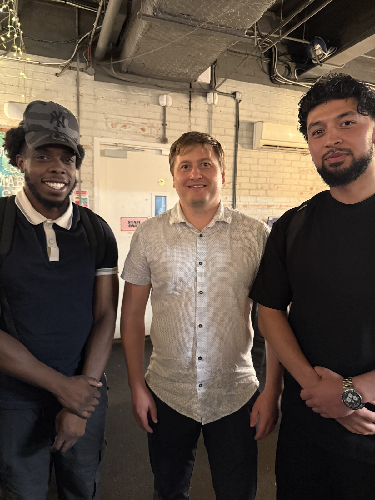 Paul Ryazanov with the founders of streetwear brand Akyra Official in London